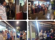 Semangat Kapolsek Tualang Hujan deras tak surutkan Sambangi Pos Kamling, Wujudkan Harkamtibmas