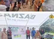 Polsek Koto Gasib Bersama BPBD, TNI, dan Upika Bahu-Membahu Bantu Warga Terdampak Banjir