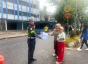 Sosialisasikan Sistem Penerimaan Murid Baru SMA Kemala Taruna Bhayangkari, polsek Tualang di Car Free Day Perawang.