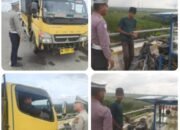 PKL Berjualan, Mobil Truck Berhenti di Atas Jembatan Maredan, Polsek Tualang Beri Himbauan dalam OPS Lilin Lancang Kuning 2025