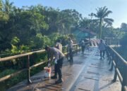 Gotong Royong Polri dan Warga, Renovasi Jembatan Merah Putih Presisi di Kampung Buatan I Dimulai