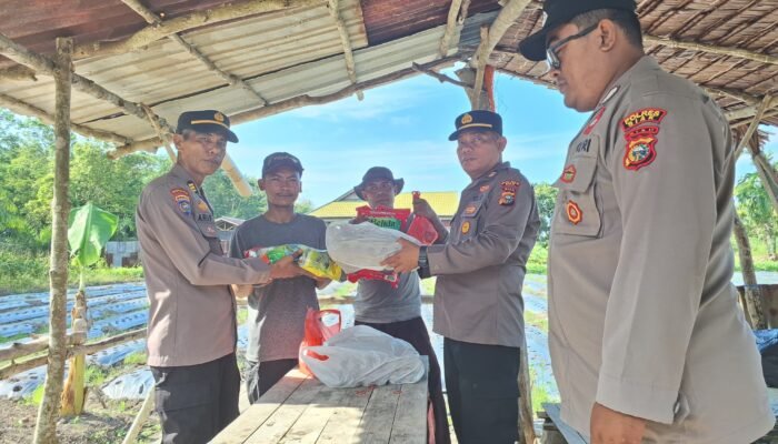 Polres Siak Salurkan Bantuan Sembako untuk Petani Jagung di Mempura